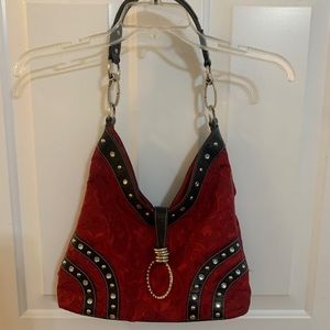 Red M.C. Purse. Like new.